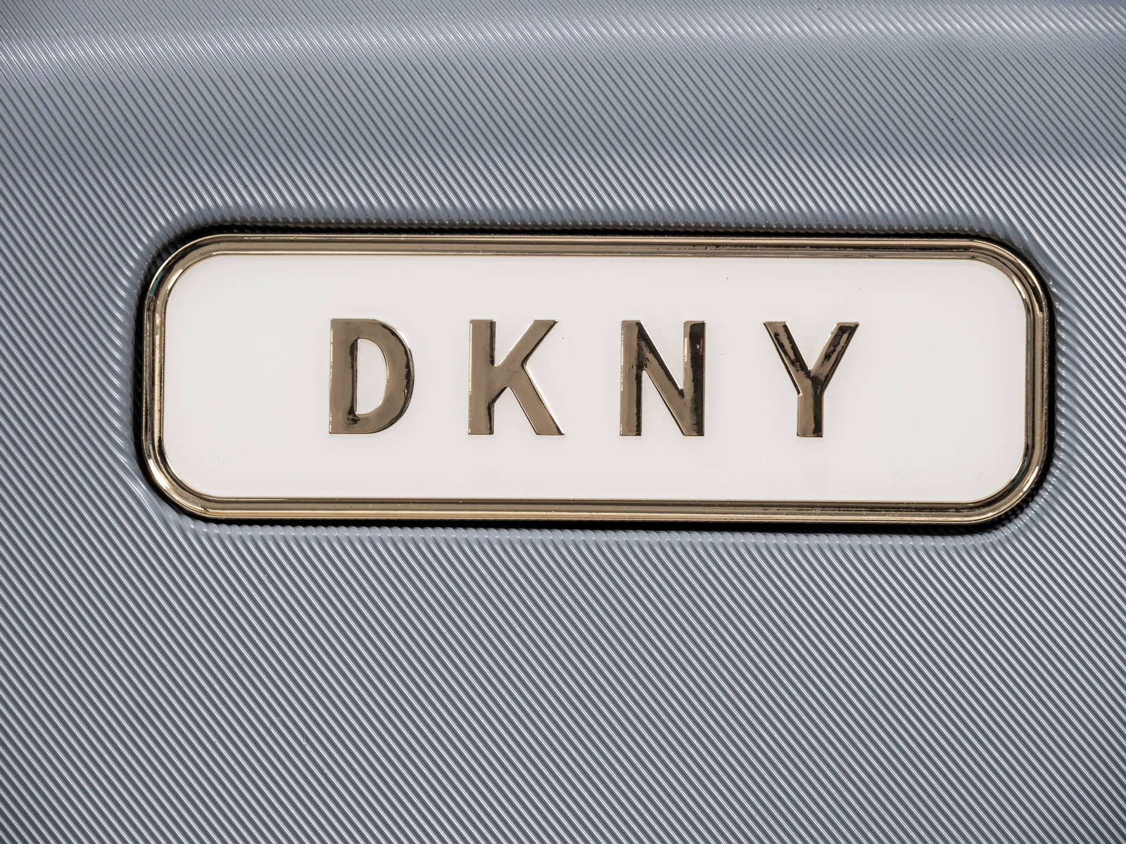 סט 3 מזוודת אופנתיות מבית  Donna Karan DKNY דגם SIX FOUR ONE