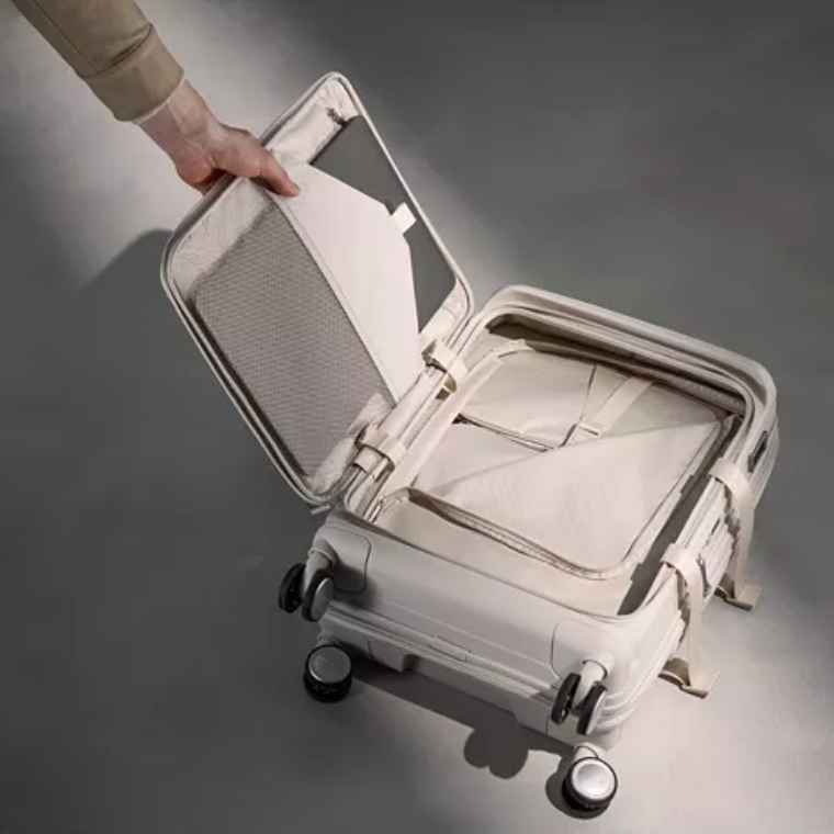 מזוודת טרולי עליה למטוס ״20 קשיחה ויוקרתית עם פתיחה כפולה ותא ייעודי ללפטופ דגם Paralux Carry-On Spinner מבית המותג העולמי Samsonite